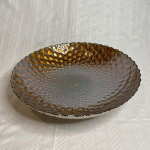 Peacock serving platter in gold tones.